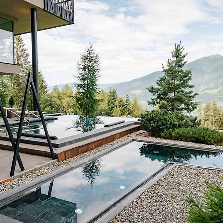 My Arbor - Dolomites Otel Bressanone Dış mekan fotoğraf A private swimming pool in the Alps